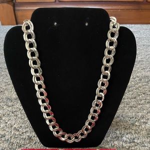 Silver chain linked necklace and bracelet